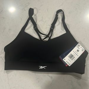 brand new lux strappy sports bra